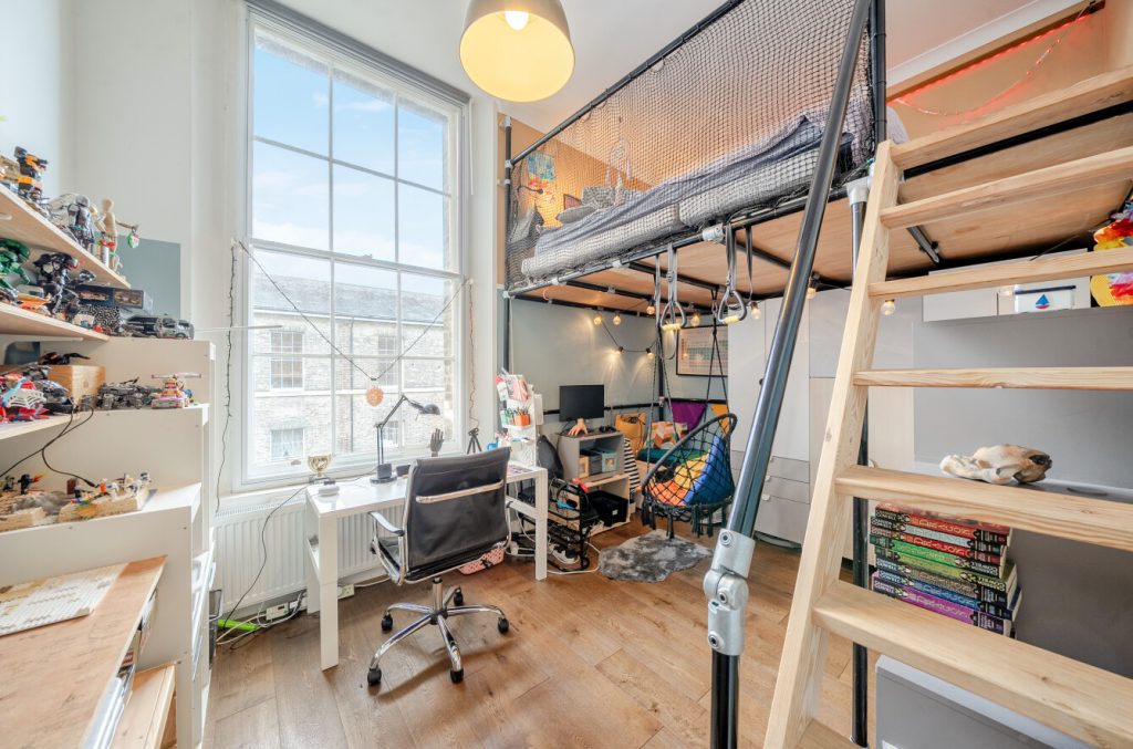 The second bedroom's mezzanine creates additional accomodation for family