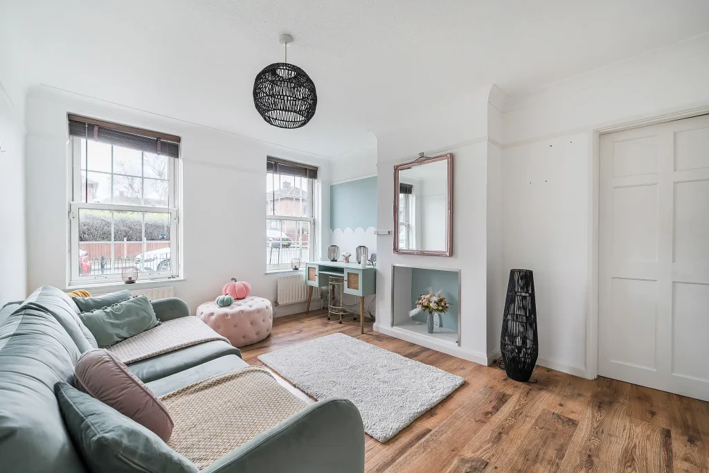 Spacious living room area ideal for relaxing or entertaining in the Dittisham Road apartment.