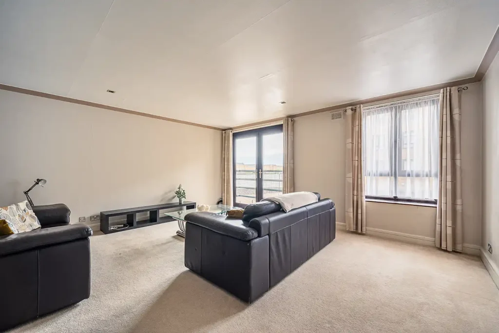 Living Room with Balcony Access