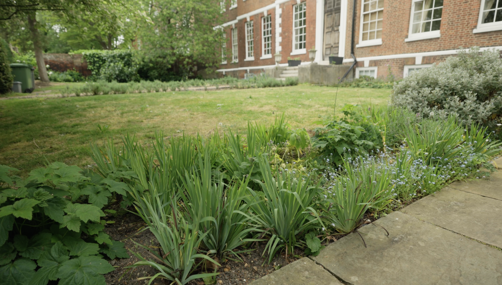 Communal gardens of Spencer House are well-maintained and manicured.