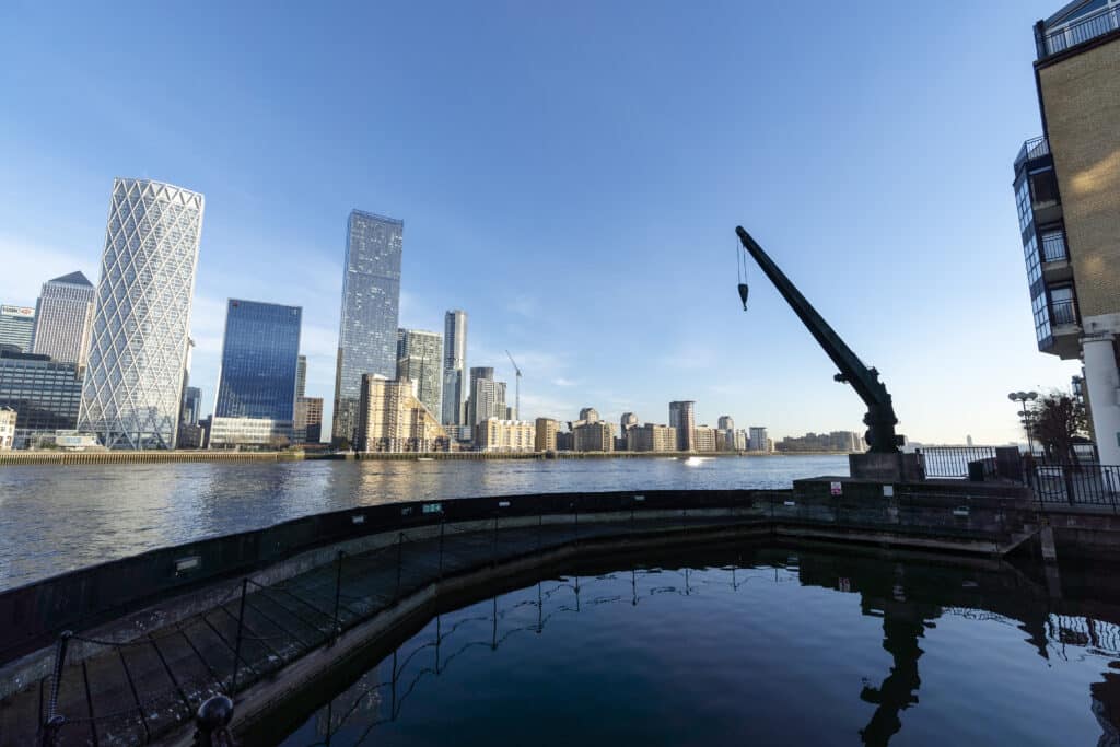 A crane marks the wharf where this large luxury estate is situated.